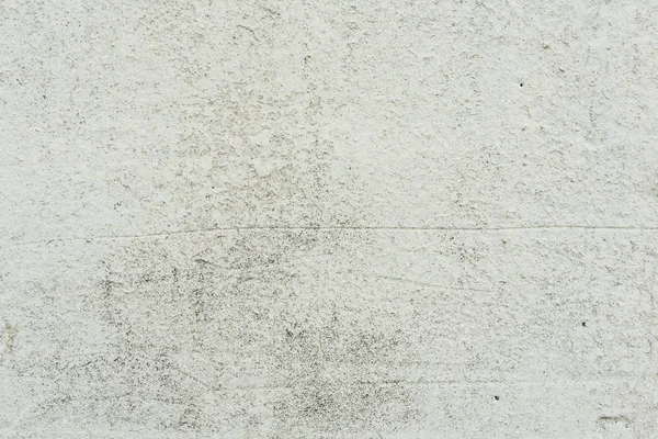 Çizikler ve çatlaklar ile duvar parçası. Arka plan olarak kullanılabilir