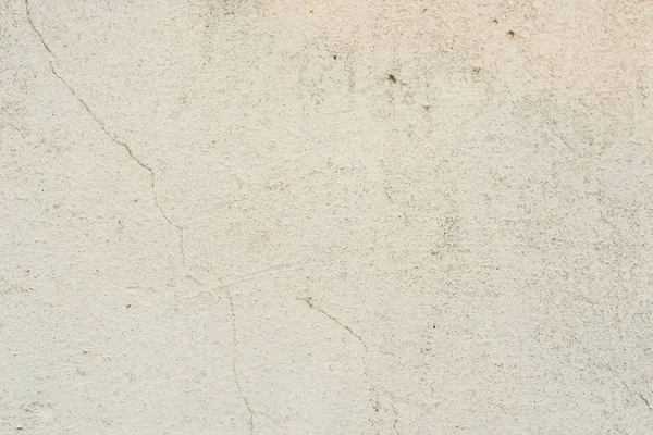 Çizikler ve çatlaklar ile duvar parçası. Arka plan olarak kullanılabilir