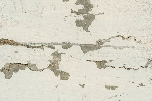 Çizikler ve çatlaklar ile duvar parçası. Arka plan olarak kullanılabilir