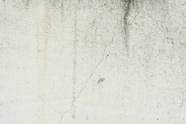 Çizikler ve çatlaklar ile duvar parçası. Arka plan olarak kullanılabilir