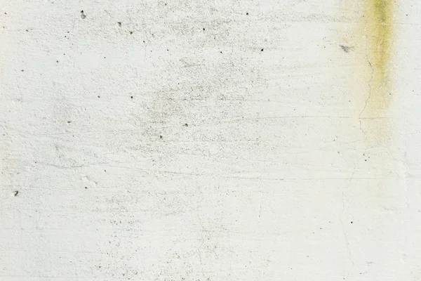 Çizikler ve çatlaklar ile duvar parçası. Arka plan olarak kullanılabilir