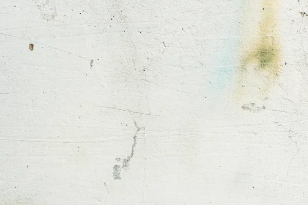 Çizikler ve çatlaklar ile duvar parçası. Arka plan olarak kullanılabilir