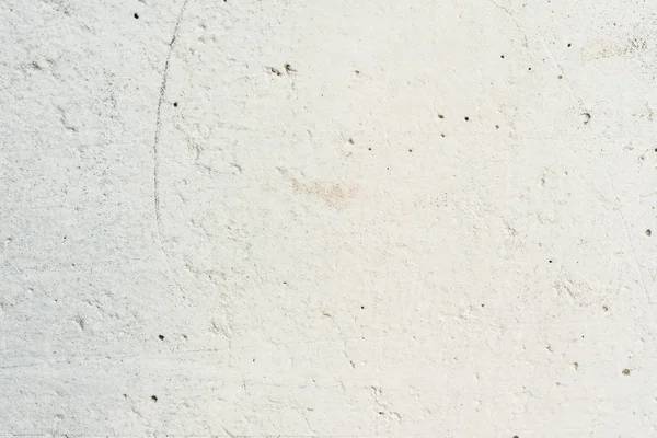 Çizikler ve çatlaklar ile duvar parçası. Arka plan olarak kullanılabilir