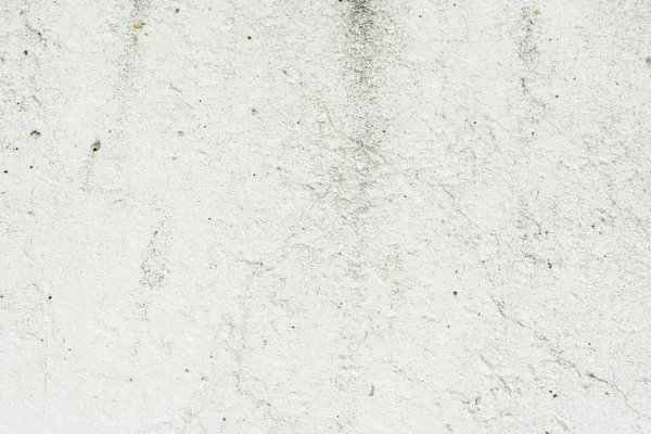 Çizikler ve çatlaklar ile duvar parçası. Arka plan olarak kullanılabilir