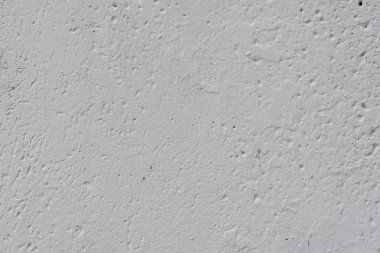 Çizikler ve çatlaklar ile duvar parçası. Arka plan olarak kullanılabilir