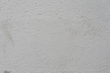 Çizikler ve çatlaklar ile duvar parçası. Arka plan olarak kullanılabilir