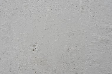 Çizikler ve çatlaklar ile duvar parçası. Arka plan olarak kullanılabilir