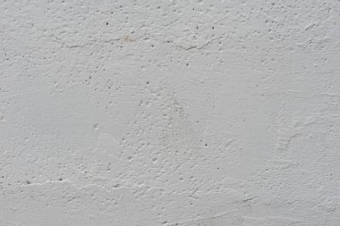 Çizikler ve çatlaklar ile duvar parçası. Arka plan olarak kullanılabilir