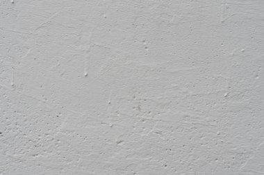 Çizikler ve çatlaklar ile duvar parçası. Arka plan olarak kullanılabilir