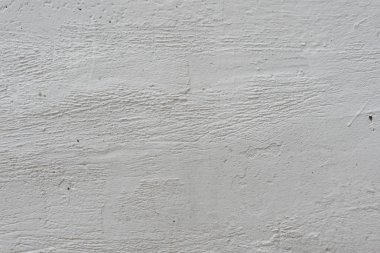 Çizikler ve çatlaklar ile duvar parçası. Arka plan olarak kullanılabilir