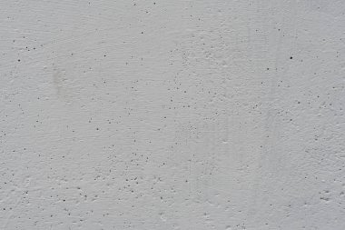 Çizikler ve çatlaklar ile duvar parçası. Arka plan olarak kullanılabilir