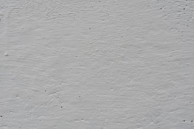 Çizikler ve çatlaklar ile duvar parçası. Arka plan olarak kullanılabilir