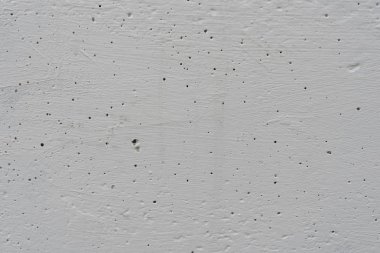 Çizikler ve çatlaklar ile duvar parçası. Arka plan olarak kullanılabilir