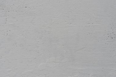 Çizikler ve çatlaklar ile duvar parçası. Arka plan olarak kullanılabilir