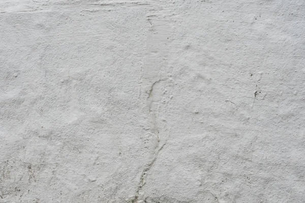 Çizikler ve çatlaklar ile duvar parçası. Arka plan olarak kullanılabilir