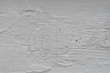 Çizikler ve çatlaklar ile duvar parçası. Arka plan olarak kullanılabilir