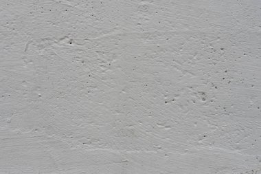 Çizikler ve çatlaklar ile duvar parçası. Arka plan olarak kullanılabilir