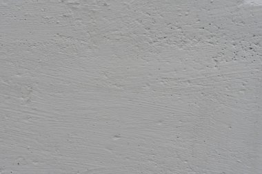 Çizikler ve çatlaklar ile duvar parçası. Arka plan olarak kullanılabilir