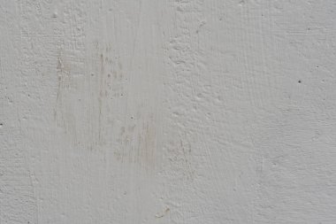 Çizikler ve çatlaklar ile duvar parçası. Arka plan olarak kullanılabilir