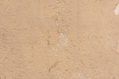 Çizikler ve çatlaklar ile duvar parçası. Arka plan olarak kullanılabilir