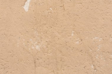 Çizikler ve çatlaklar ile duvar parçası. Arka plan olarak kullanılabilir