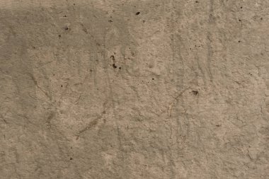 Çizikler ve çatlaklar ile duvar parçası. Arka plan olarak kullanılabilir