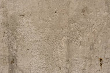 Çizikler ve çatlaklar ile duvar parçası. Arka plan olarak kullanılabilir