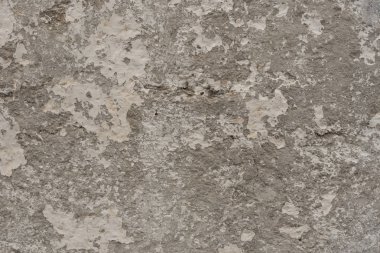 Çizikler ve çatlaklar ile duvar parçası. Arka plan olarak kullanılabilir