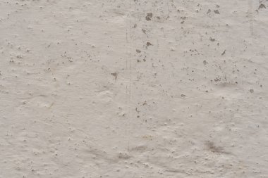 Çizikler ve çatlaklar ile duvar parçası. Arka plan olarak kullanılabilir