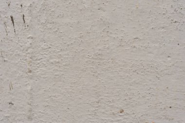 Çizikler ve çatlaklar ile duvar parçası. Arka plan olarak kullanılabilir