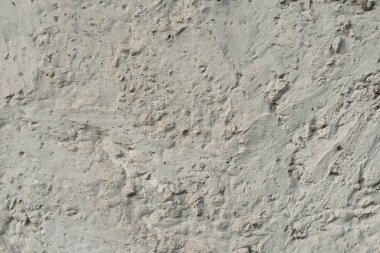 Çizikler ve çatlaklar ile duvar parçası. Arka plan olarak kullanılabilir