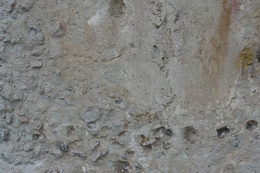 Çizikler ve çatlaklar ile duvar parçası. Arka plan olarak kullanılabilir