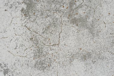 Çizikler ve çatlaklar ile duvar parçası. Arka plan olarak kullanılabilir