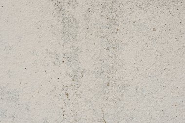 Çizikler ve çatlaklar ile duvar parçası. Arka plan olarak kullanılabilir