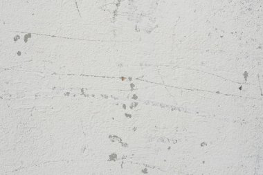 Çizikler ve çatlaklar ile duvar parçası. Arka plan olarak kullanılabilir