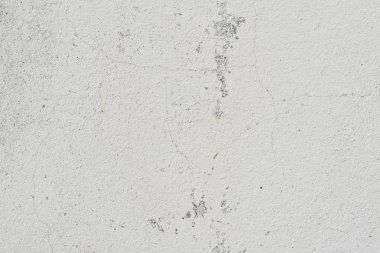 Çizikler ve çatlaklar ile duvar parçası. Arka plan olarak kullanılabilir