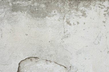 Çizikler ve çatlaklar ile duvar parçası. Arka plan olarak kullanılabilir