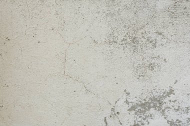 Çizikler ve çatlaklar ile duvar parçası. Arka plan olarak kullanılabilir