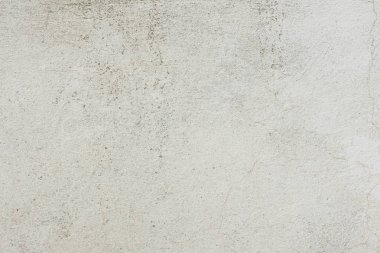 Çizikler ve çatlaklar ile duvar parçası. Arka plan olarak kullanılabilir