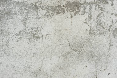 Çizikler ve çatlaklar ile duvar parçası. Arka plan olarak kullanılabilir