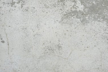 Çizikler ve çatlaklar ile duvar parçası. Arka plan olarak kullanılabilir