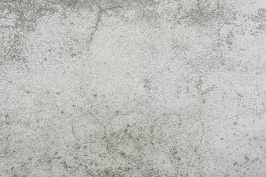 Çizikler ve çatlaklar ile duvar parçası. Arka plan olarak kullanılabilir