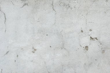 Çizikler ve çatlaklar ile duvar parçası. Arka plan olarak kullanılabilir