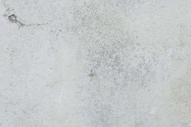 Çizikler ve çatlaklar ile duvar parçası. Arka plan olarak kullanılabilir