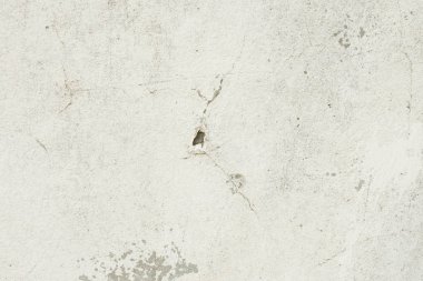 Çizikler ve çatlaklar ile duvar parçası. Arka plan olarak kullanılabilir