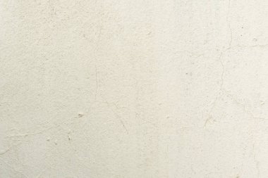 Çizikler ve çatlaklar ile duvar parçası. Arka plan olarak kullanılabilir