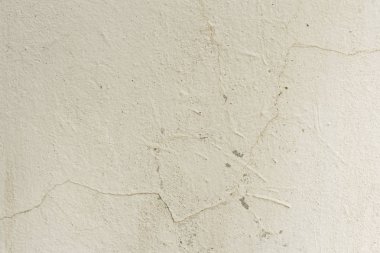 Çizikler ve çatlaklar ile duvar parçası. Arka plan olarak kullanılabilir