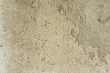 Çizikler ve çatlaklar ile duvar parçası. Arka plan olarak kullanılabilir