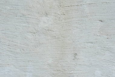 Çizikler ve çatlaklar ile duvar parçası. Arka plan olarak kullanılabilir