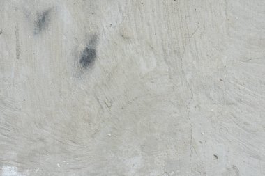 Çizikler ve çatlaklar ile duvar parçası. Arka plan olarak kullanılabilir